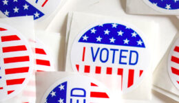 Close up of a bunch of "I Voted" stickers.