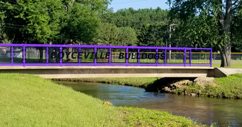 "Boyceville Bulldogs" sign on the purple bridge crossing Tiffany Creek in the Village of Boyceville, Wisconsin.