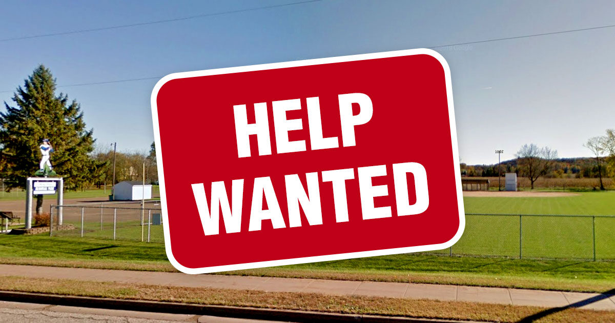 Help Wanted sign overlaid onto a baseball field in Boyceville, Wisconsin.