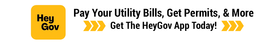 Ad for HeyGov saying "Pay Your Utility Bills, Get Permits, & More. Get The HeyGov App Today!"