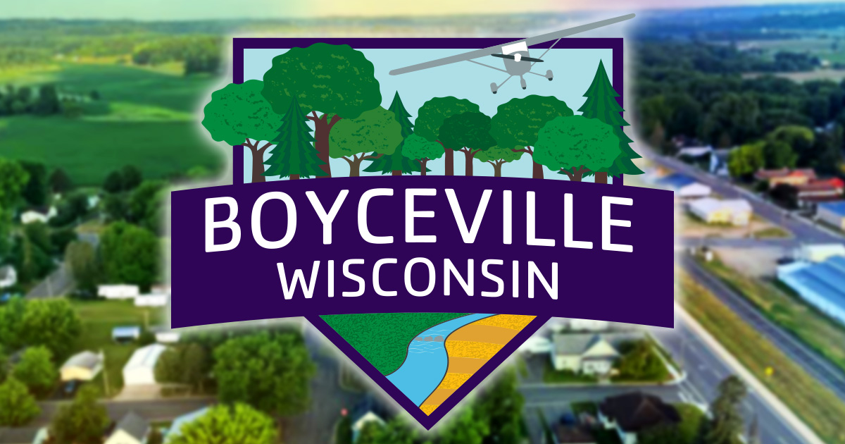 New logo for the Village of Boyceville, Wisconsin overlaid on a blurred photo of downtown Boyceville.